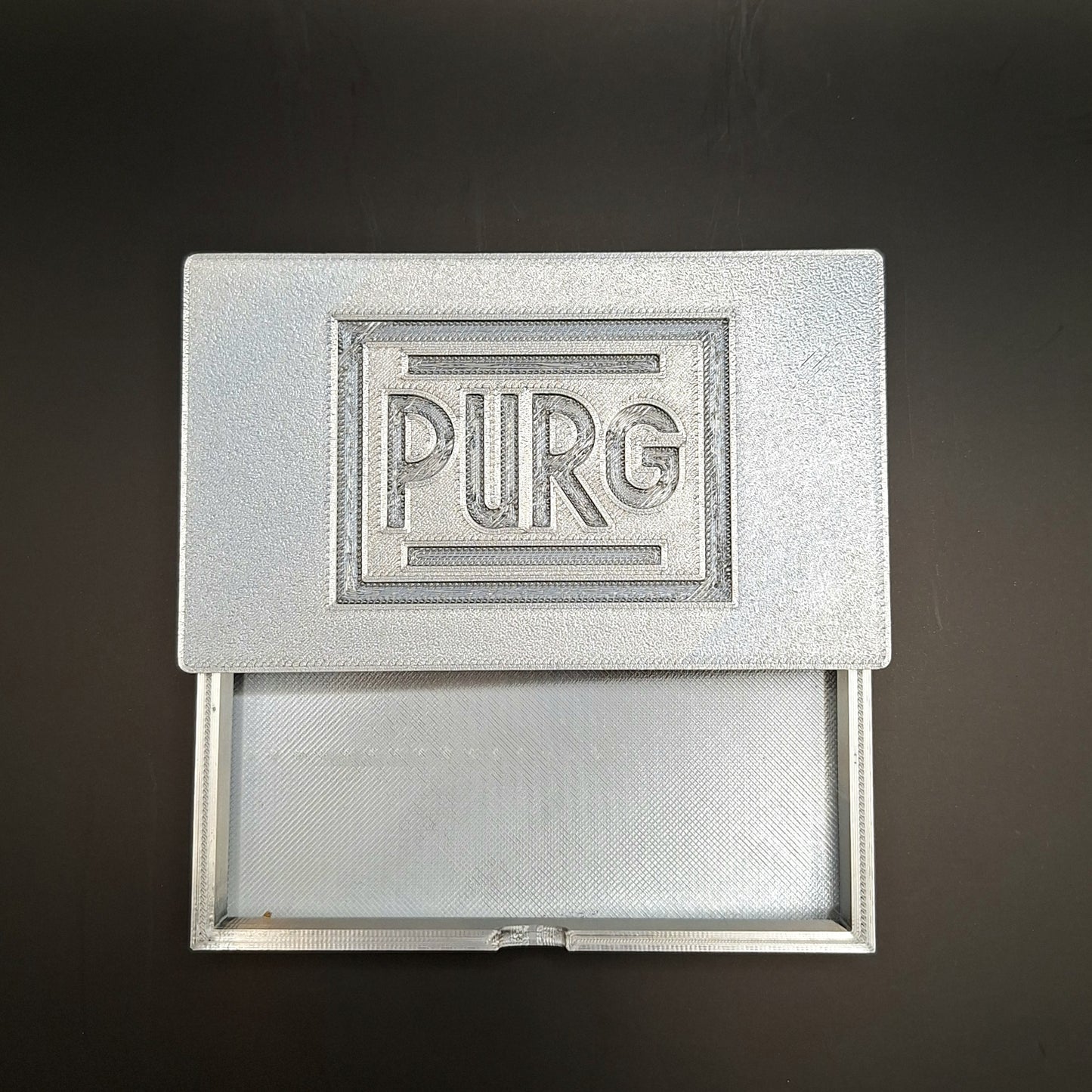 CAJA DE PURGA