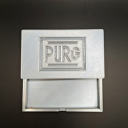 CAJA DE PURGA