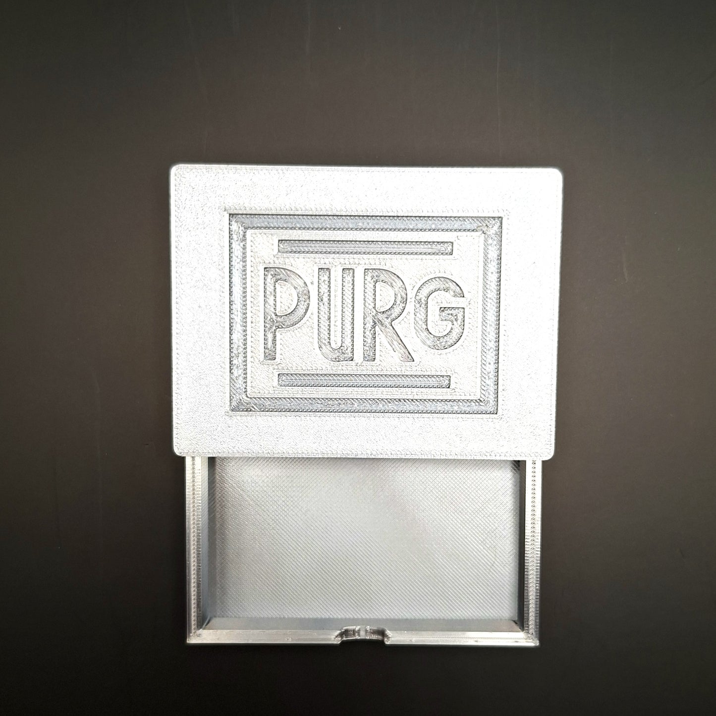 CAJA DE PURGA